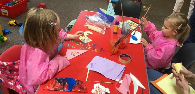 Pre-school children doing a craft activity